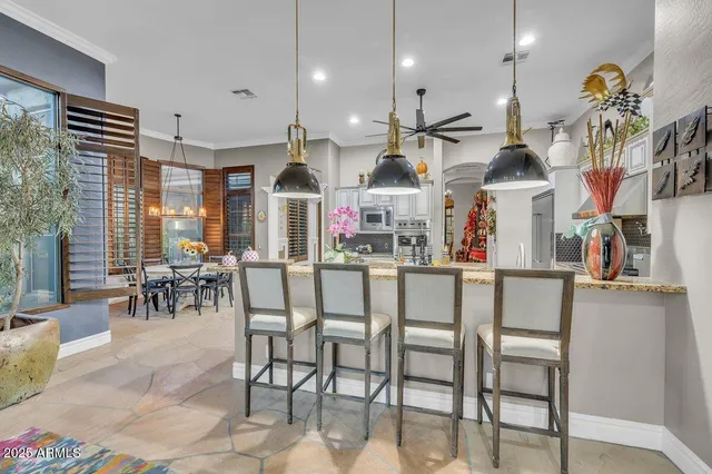 a front view of a dining room with furniture