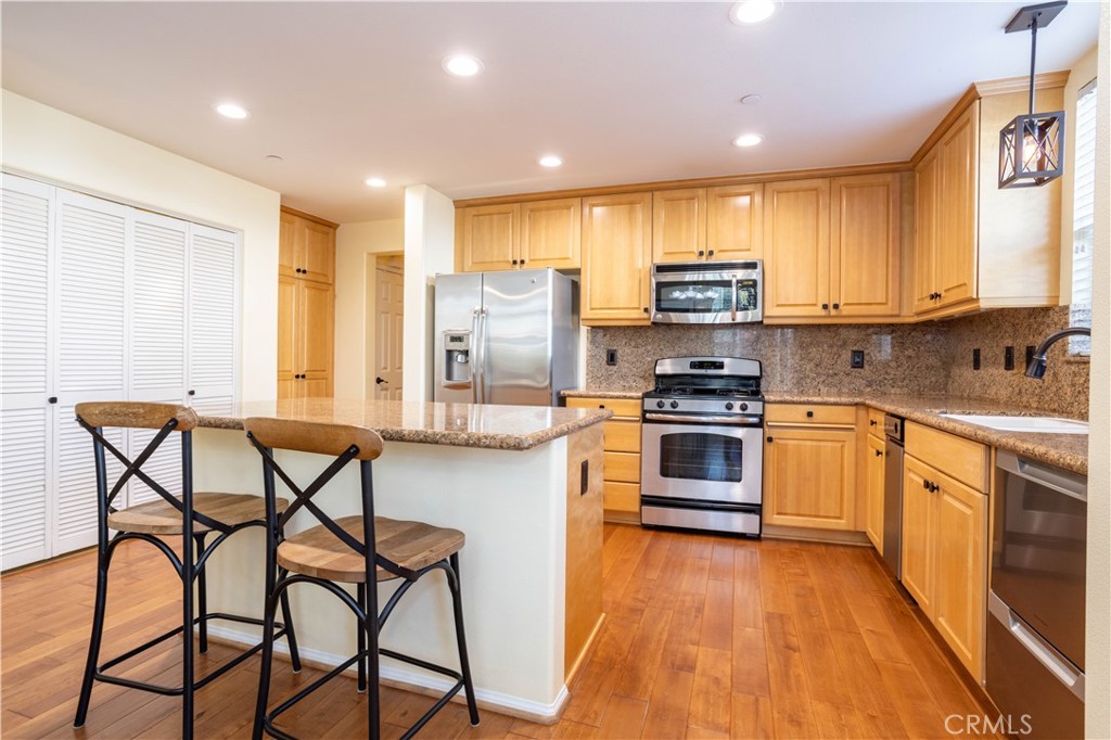20335 Paseo Meriana Porter Ranch, CA 91326 - Photo 7 of 58 Kitchen with Center Island