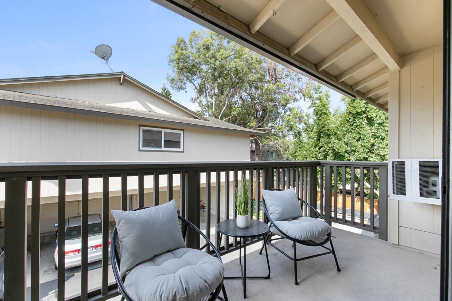 108 East Middlefield Road, Unit D Mountain View, CA 94043 - Photo 11 of 23 a balcony with wooden floor outdoor seating and furniture