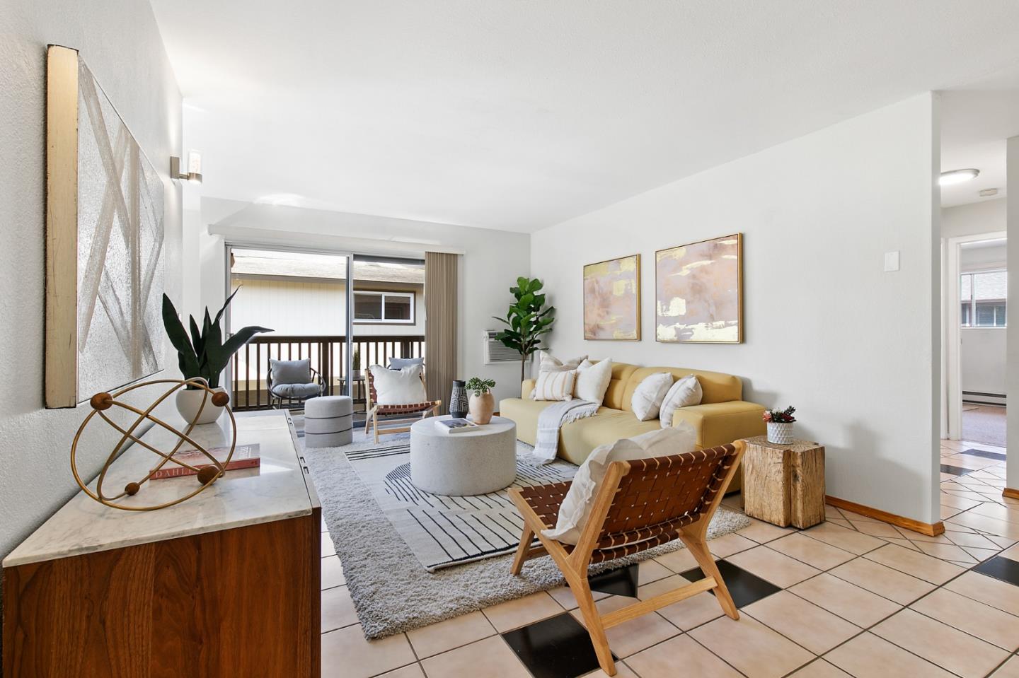 108 East Middlefield Road, Unit D Mountain View, CA 94043 - Photo 3 of 23 a living room with furniture a wooden floor and a potted plant