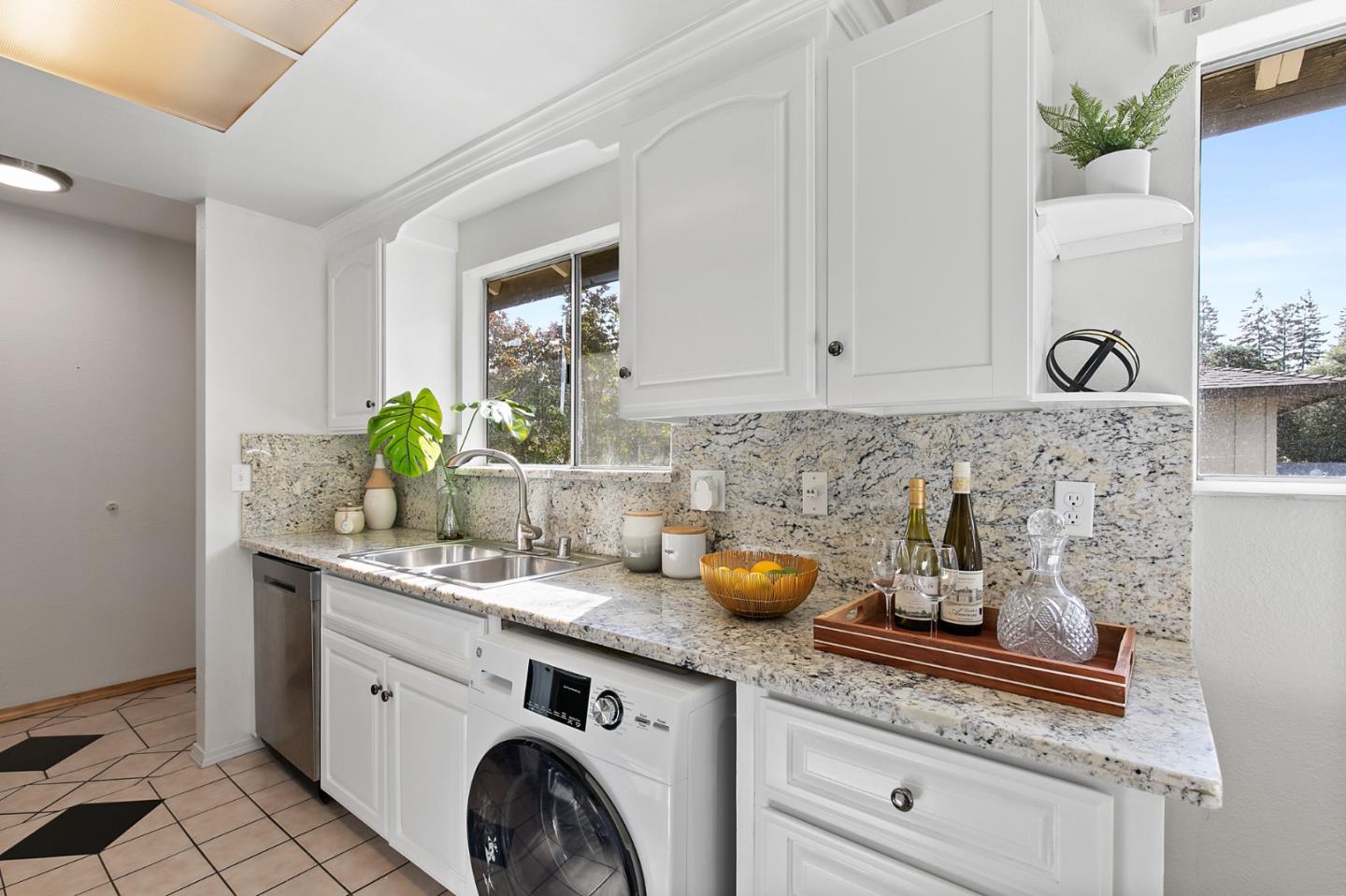 108 East Middlefield Road, Unit D Mountain View, CA 94043 - Photo 7 of 23 a kitchen with a sink and cabinets