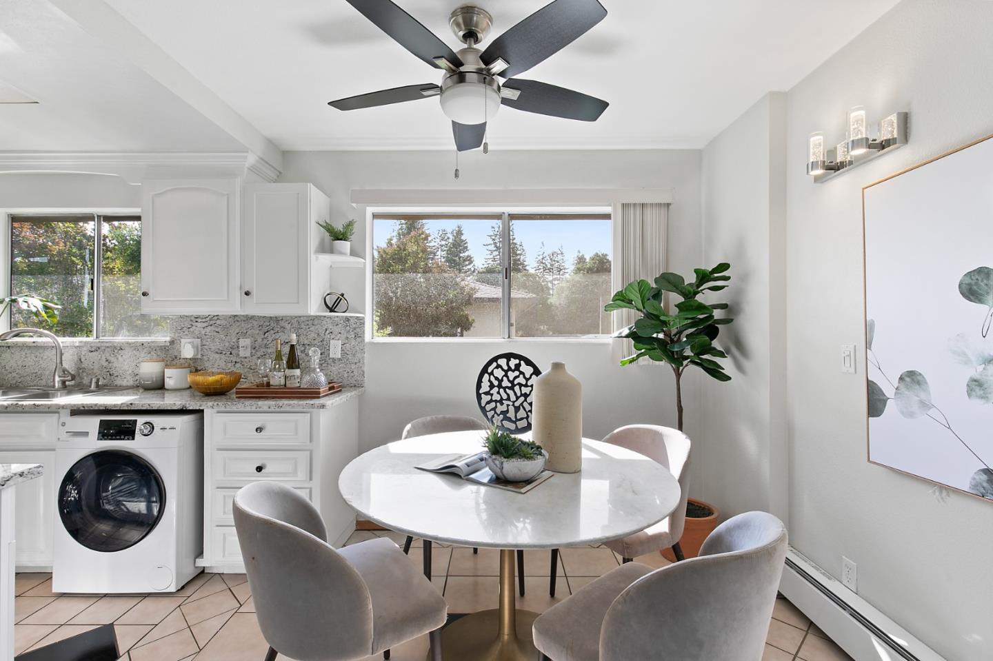 108 East Middlefield Road, Unit D Mountain View, CA 94043 - Photo 10 of 23 a view of a dining room with furniture window and wooden floor