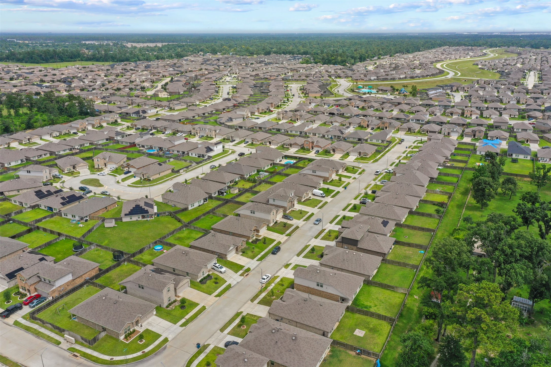 23711 Blodgett Peak Trail Spring, TX 77373 - Photo 28 of 32 an aerial view of residential houses with outdoor space