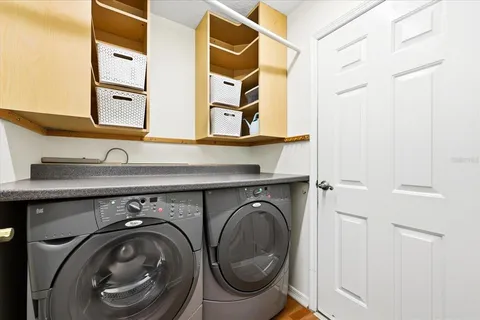 a utility room with dryer and washer
