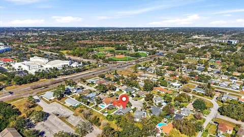 an aerial view of residential building with parking space
