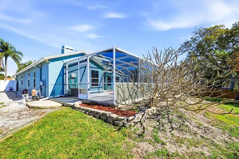 front view of a house with a garden