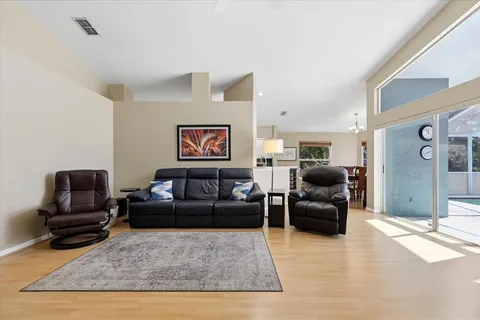 a living room with furniture window and a lamp