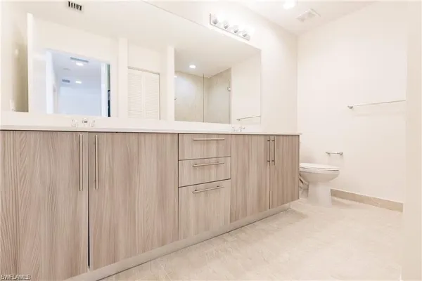 a bathroom with a sink and shower