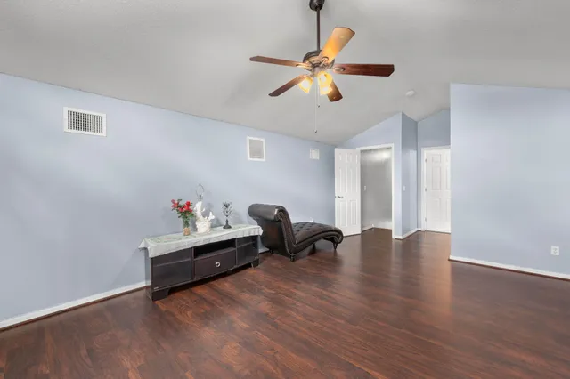 a view of livingroom with furniture and wooden floor