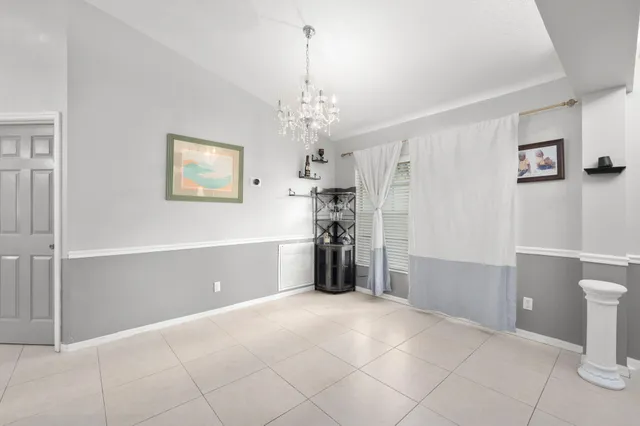 a view of a storage & utility room with a window