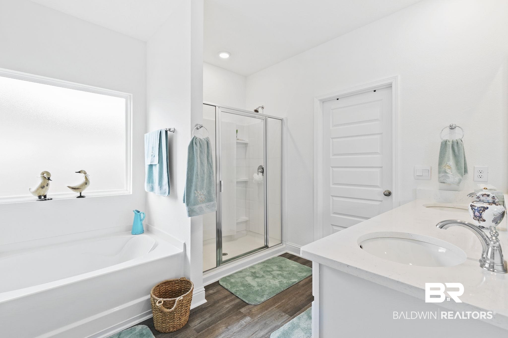 1141 Pencarro Boulevard Foley, AL 36535 - Photo 24 of 70 Bathroom with hardwood / wood-style flooring, vanity, and independent shower and bath