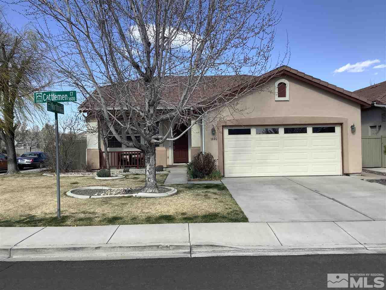 1605 Cattlemen Court Reno, NV 89521 - Photo 1 of 18 a front view of a house with garden