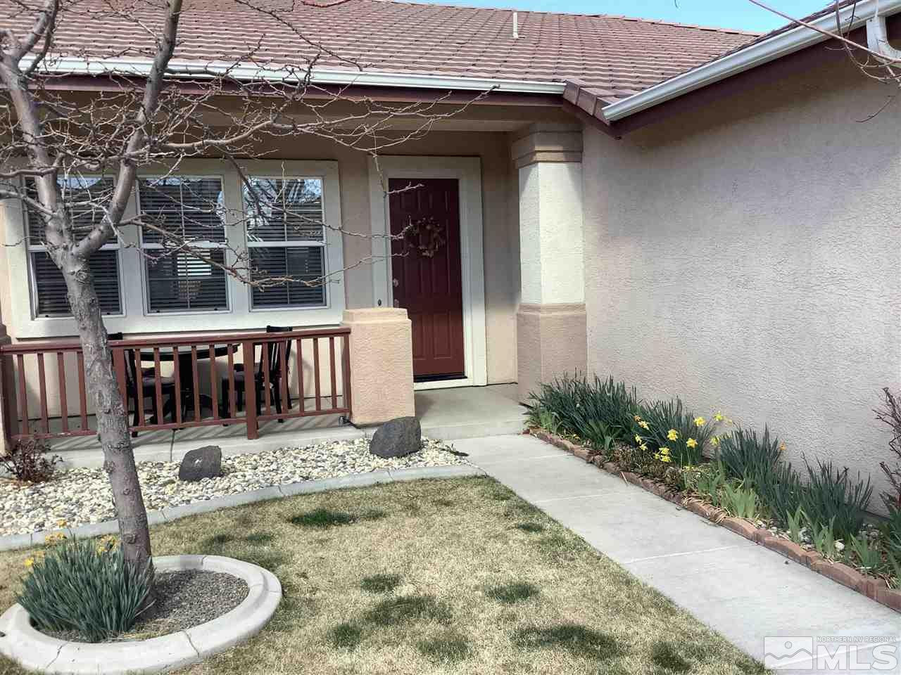1605 Cattlemen Court Reno, NV 89521 - Photo 2 of 18 a view of a house with porch and sitting area
