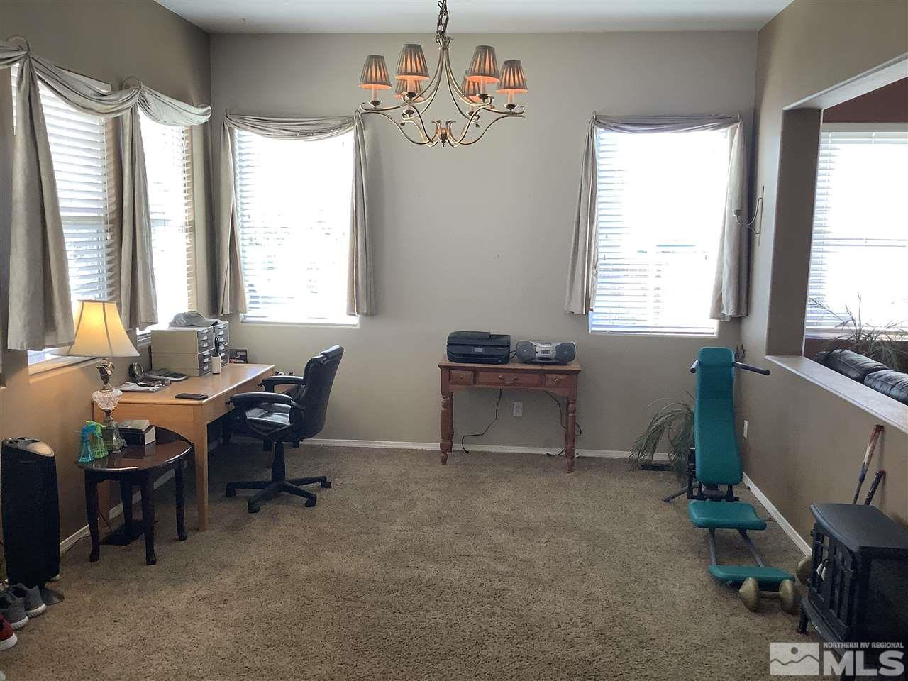 1605 Cattlemen Court Reno, NV 89521 - Photo 7 of 18 a view of a workspace with furniture and a window