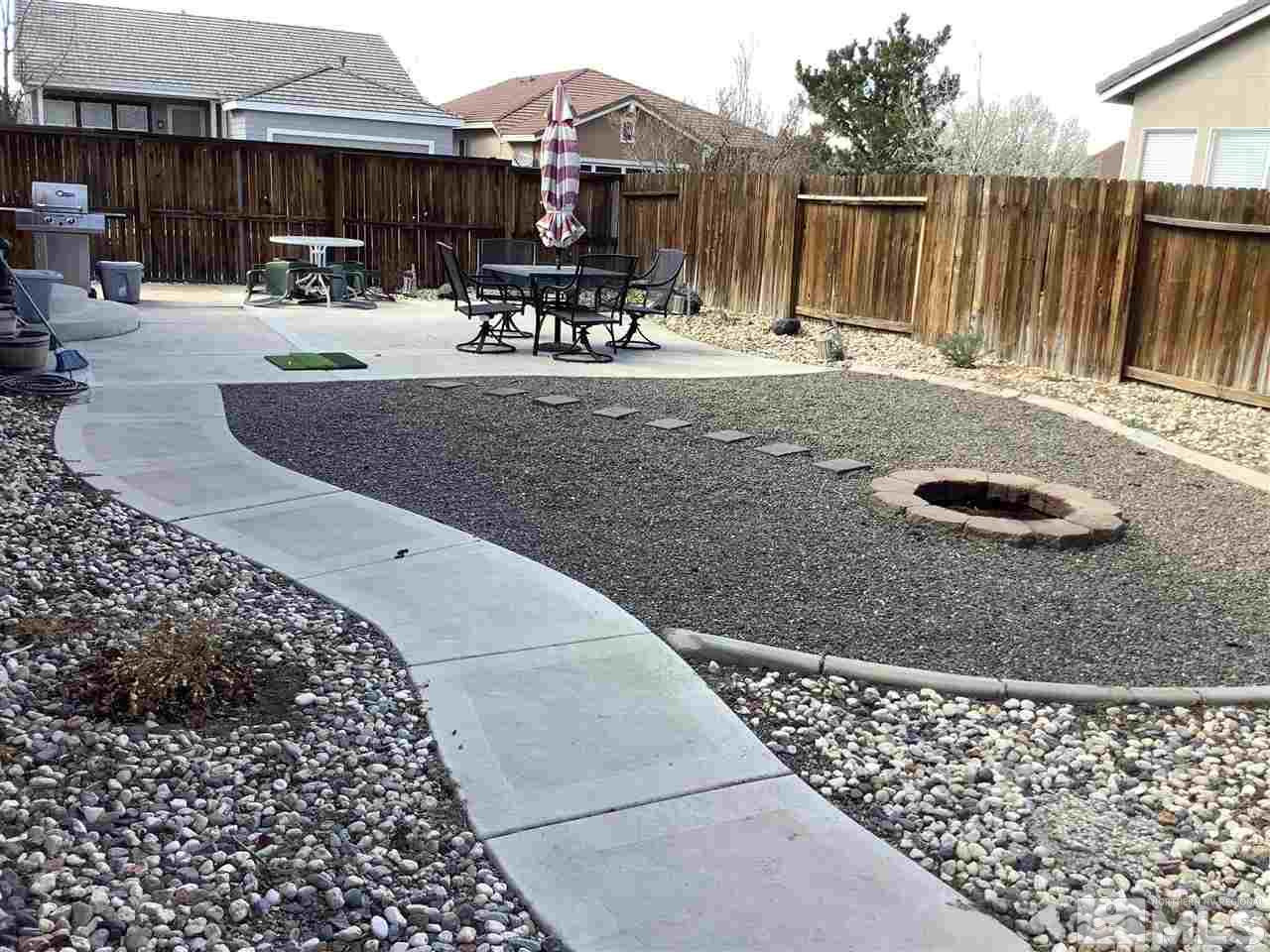 1605 Cattlemen Court Reno, NV 89521 - Photo 8 of 18 a view of a patio with a table and chairs