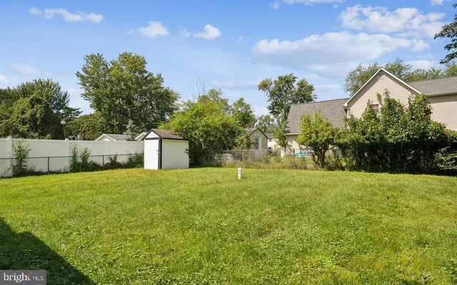 a view of backyard with deck and deck