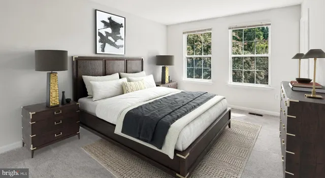 a bed room with a bed and a night stand