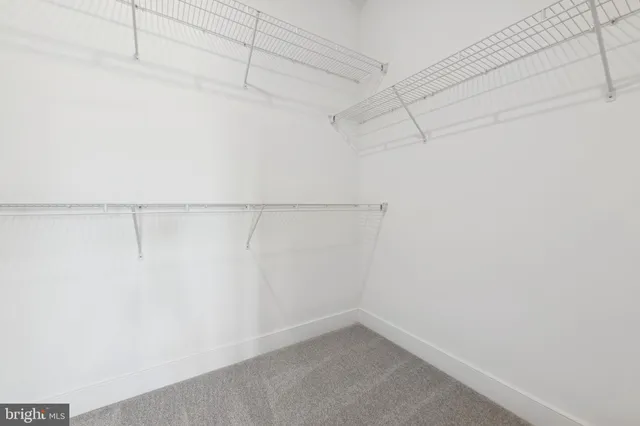 a view of a room with racks on the wall