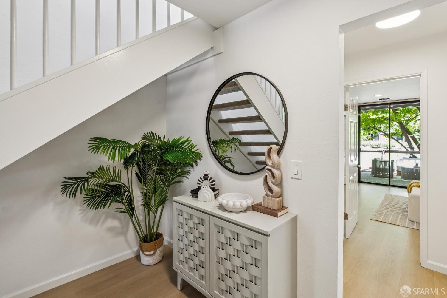 229 Cypress Point Drive Mountain View, CA 94043 - Photo 13 of 32 an entryway with wooden floor and a potted plant