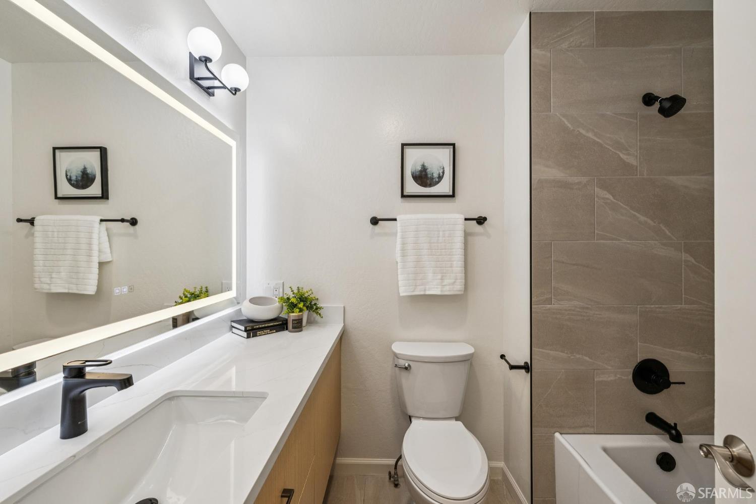 229 Cypress Point Drive Mountain View, CA 94043 - Photo 20 of 32 a bathroom with a sink a toilet and shower