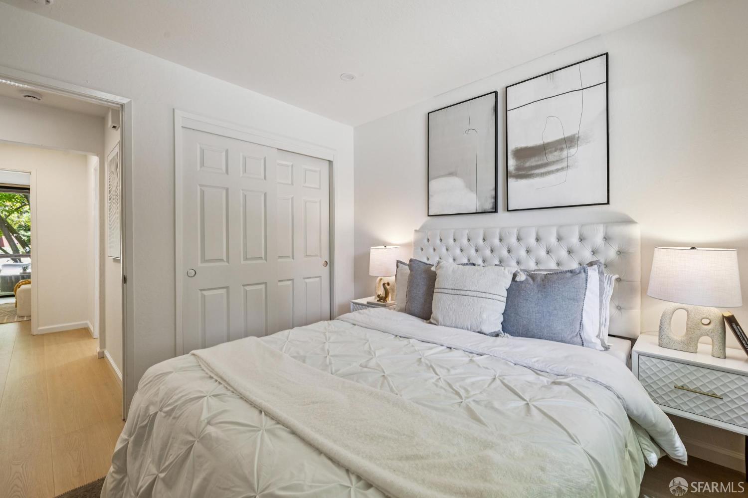 229 Cypress Point Drive Mountain View, CA 94043 - Photo 22 of 32 a bedroom with a bed and painting on the wall