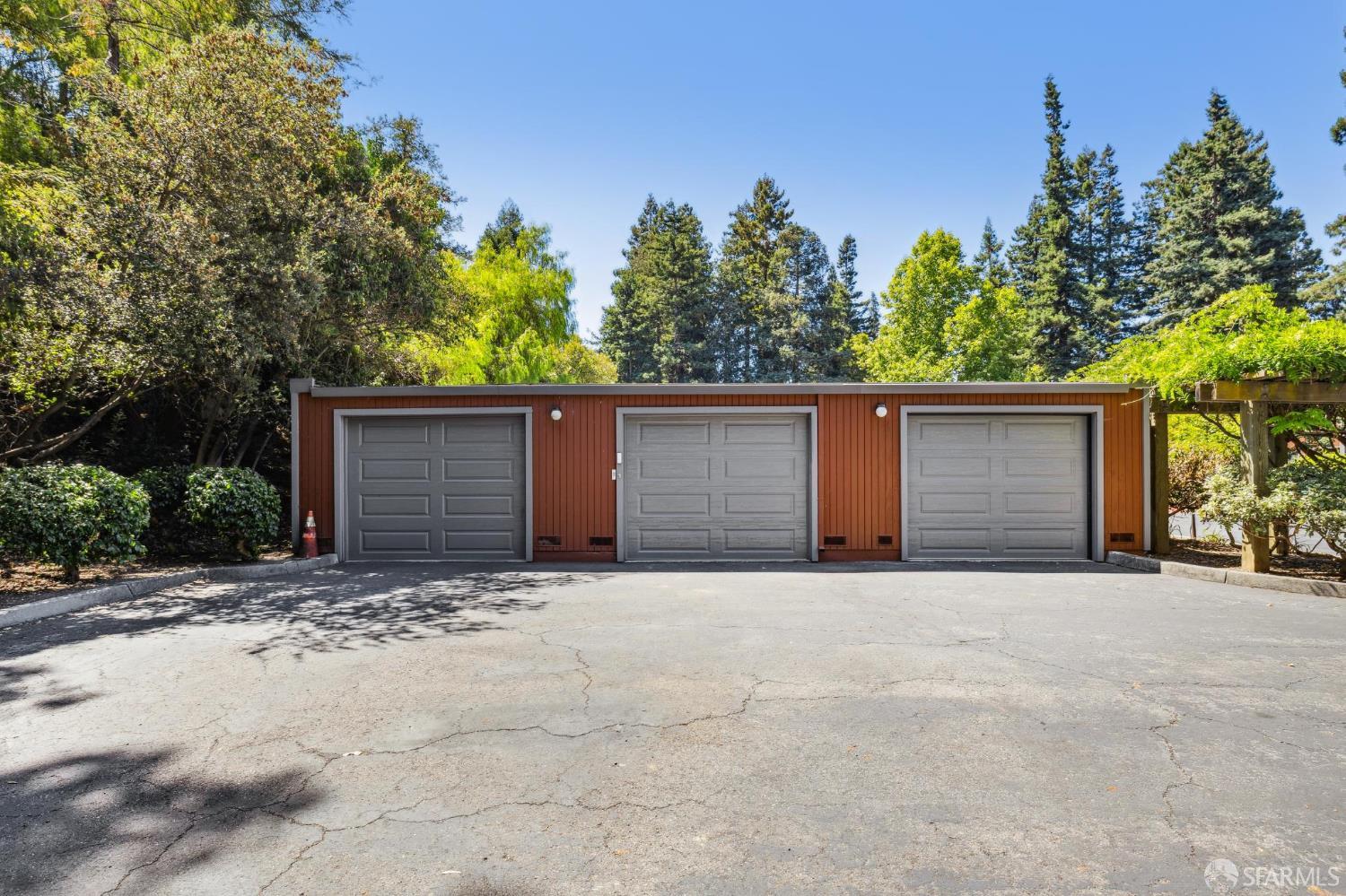 229 Cypress Point Drive Mountain View, CA 94043 - Photo 25 of 32 front view of house with yard and trees in the background