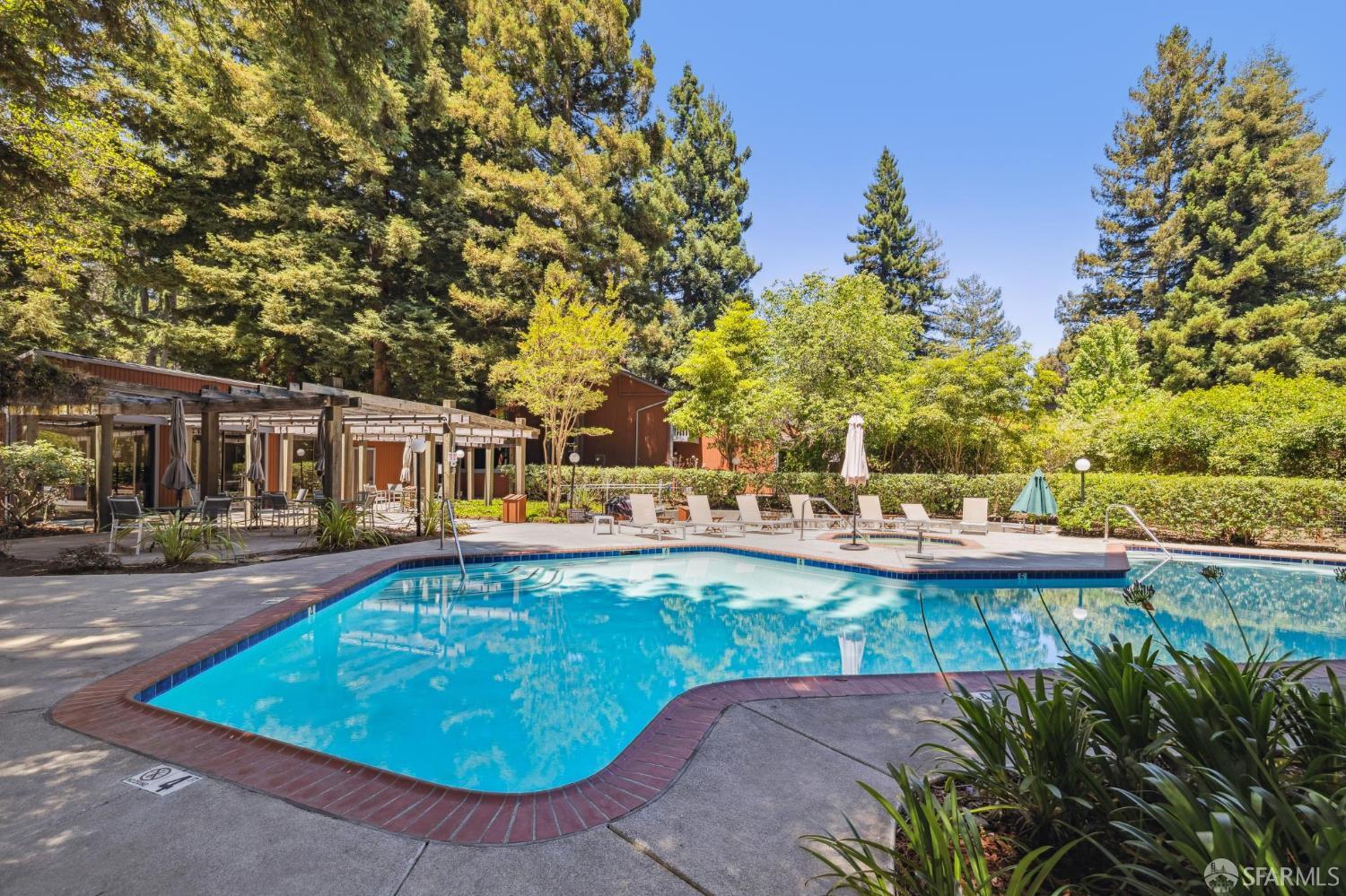 229 Cypress Point Drive Mountain View, CA 94043 - Photo 27 of 32 a view of a swimming pool with a patio