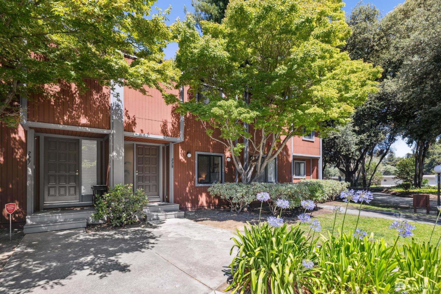 229 Cypress Point Drive Mountain View, CA 94043 - Photo 32 of 32 a front view of a house with swimming pool and porch
