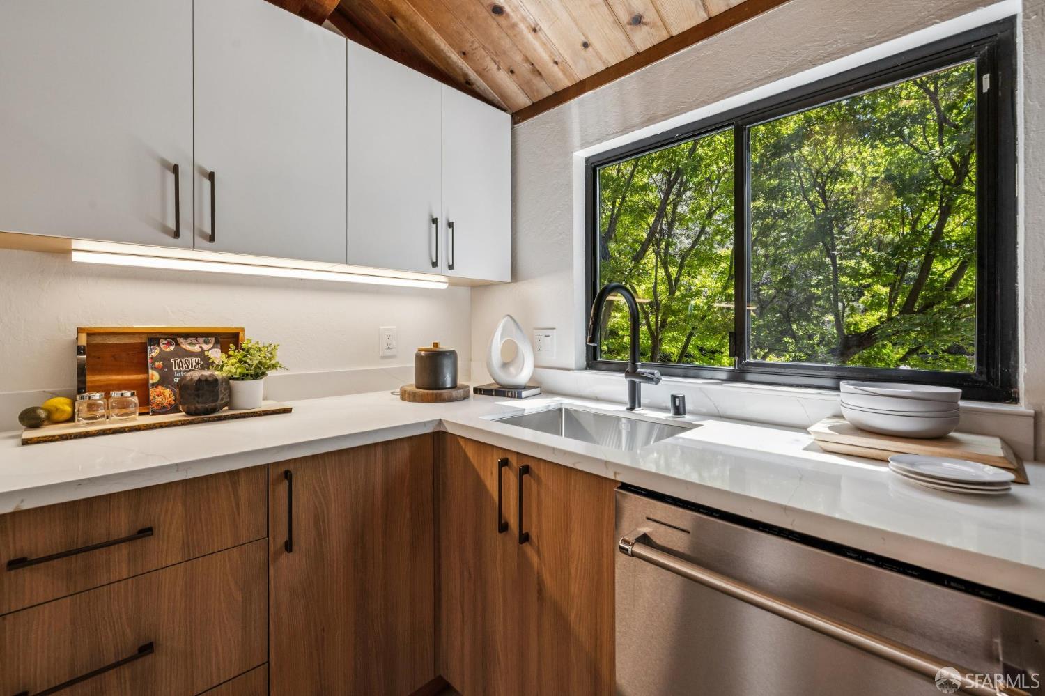 229 Cypress Point Drive Mountain View, CA 94043 - Photo 9 of 32 a kitchen with a sink and large window