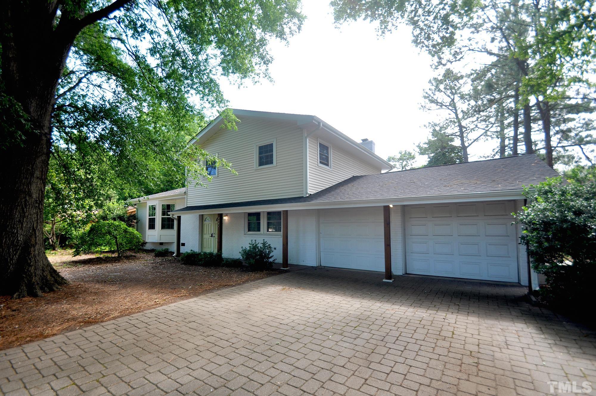 2401 Sanderford Road Raleigh, NC 27610 - Photo 1 of 31 a front view of house with yard and trees around