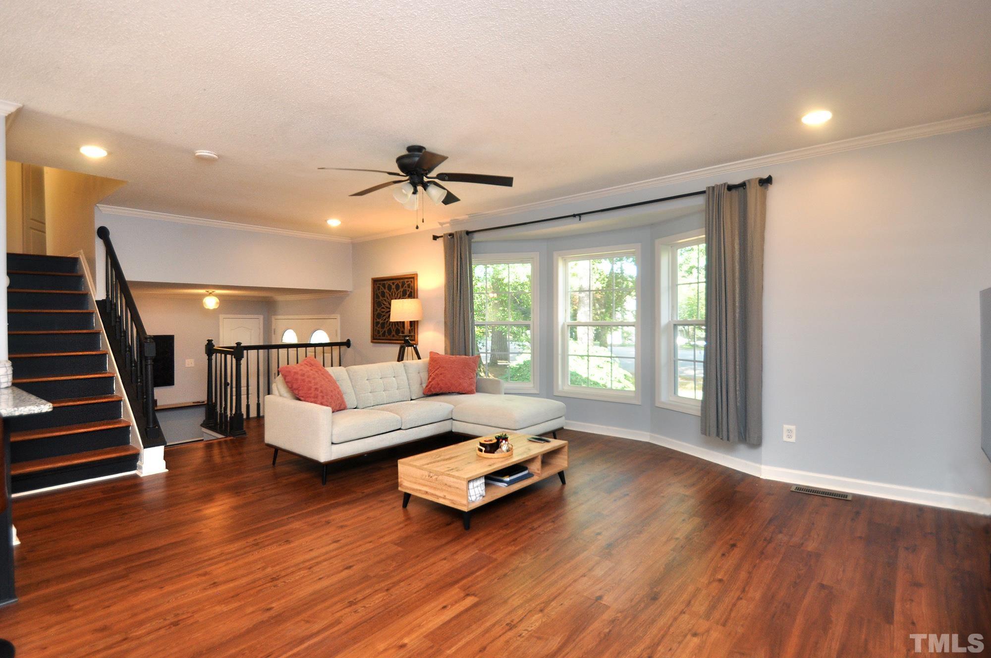 2401 Sanderford Road Raleigh, NC 27610 - Photo 6 of 31 a living room with furniture and a large window