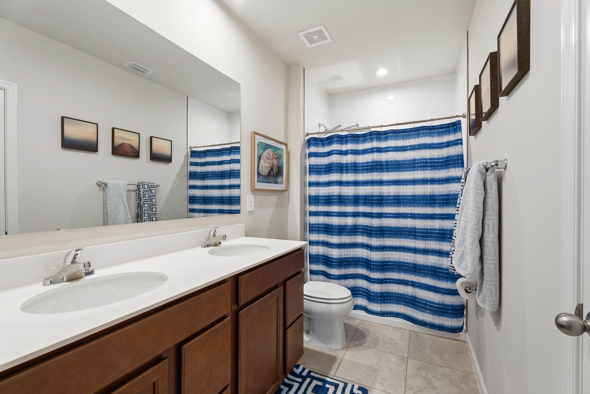 271 Raspberry Road Fort Pierce, FL 34981 - Photo 14 of 42 a bathroom with a sink and a mirror