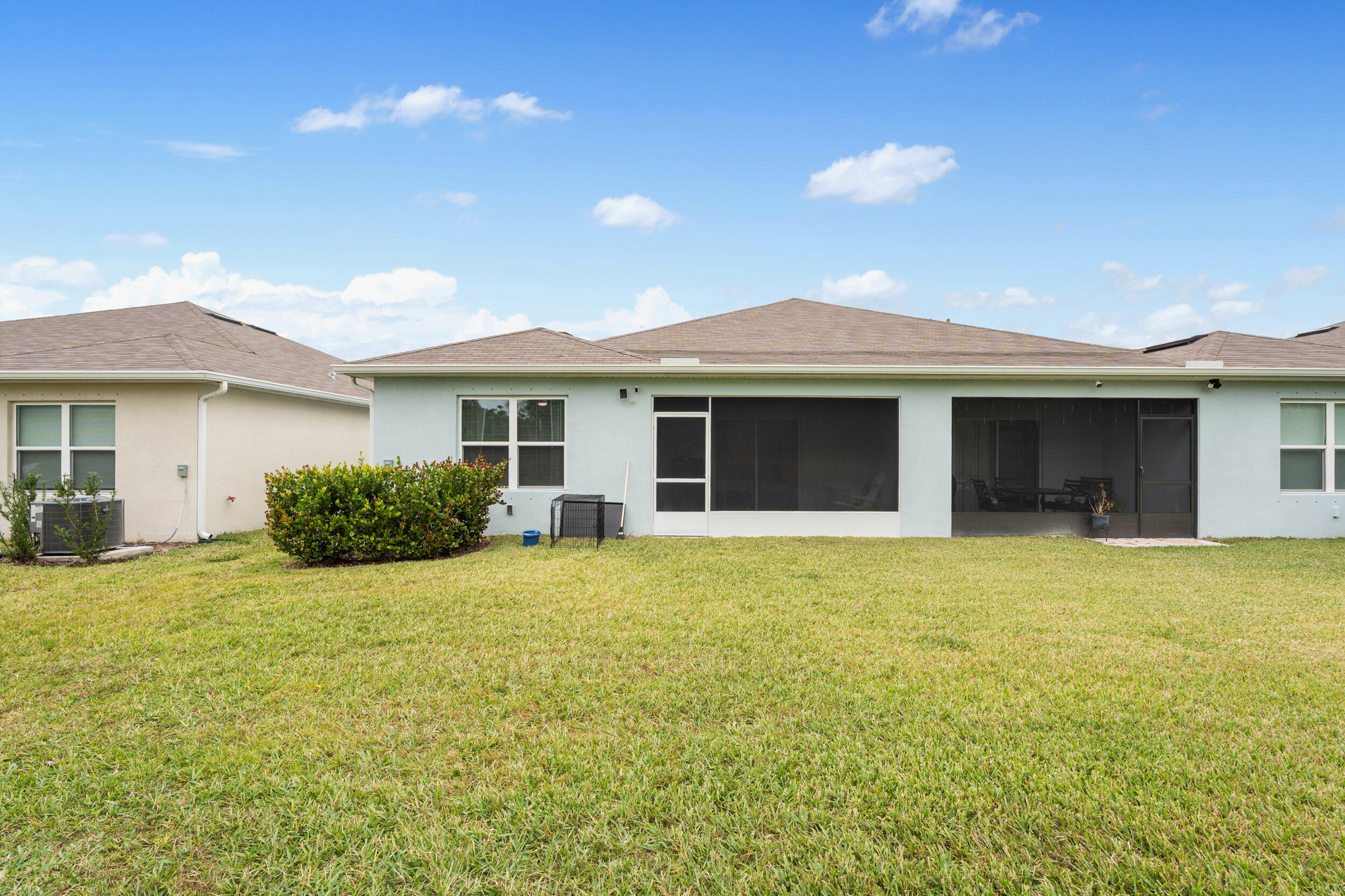 271 Raspberry Road Fort Pierce, FL 34981 - Photo 24 of 42 a view of a house with a garden and yard