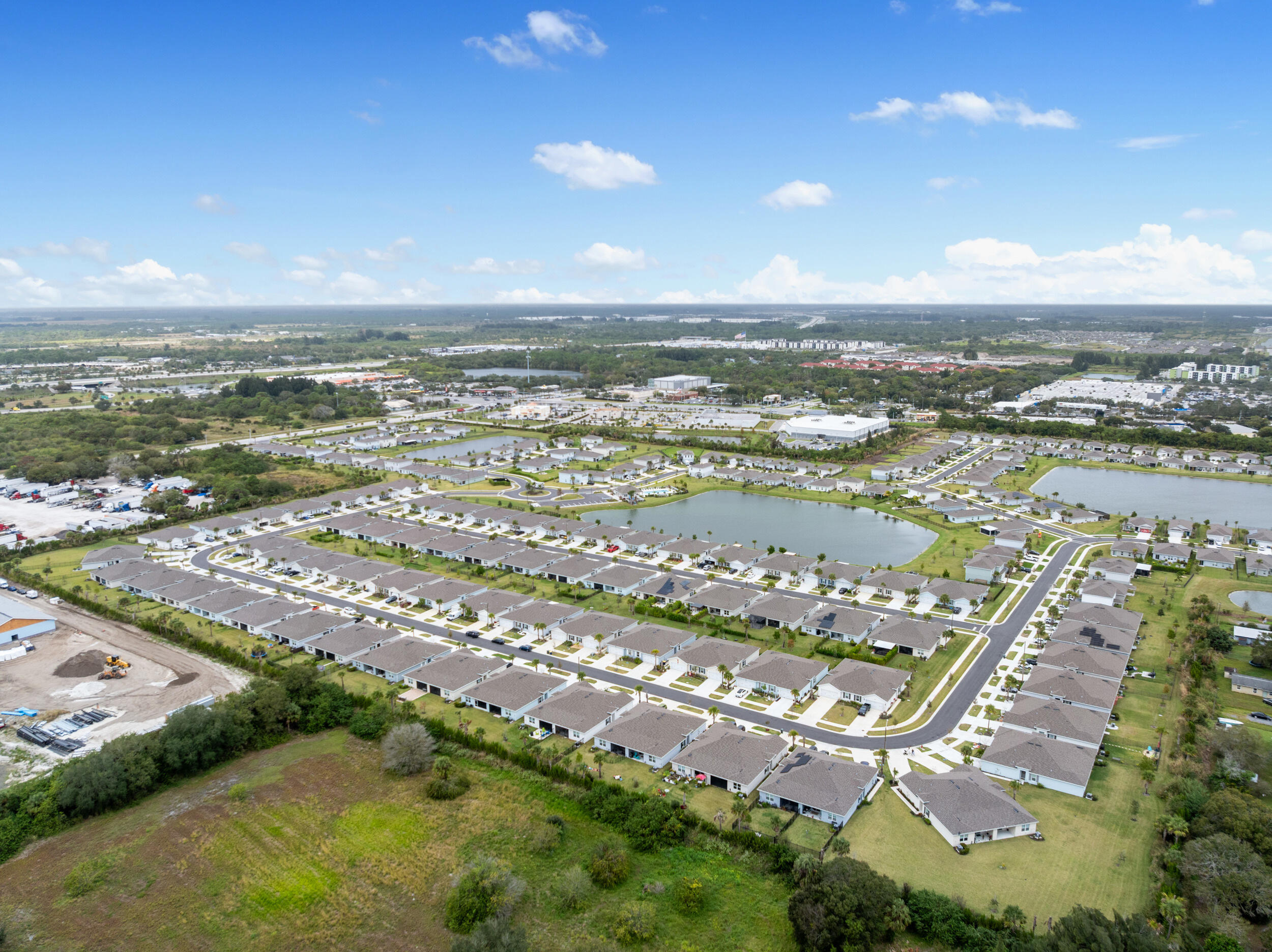 271 Raspberry Road Fort Pierce, FL 34981 - Photo 39 of 42 an aerial view of residential building and lake