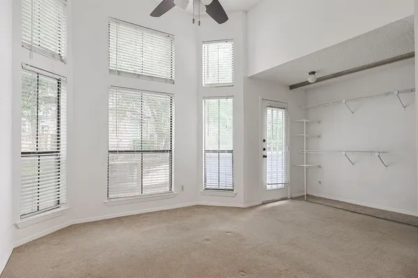 an empty room with windows