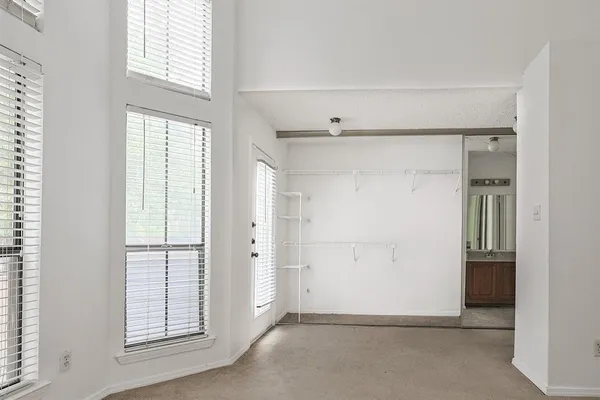 an empty room with windows