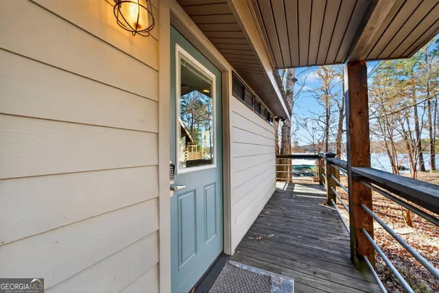 a view of balcony with wooden floor