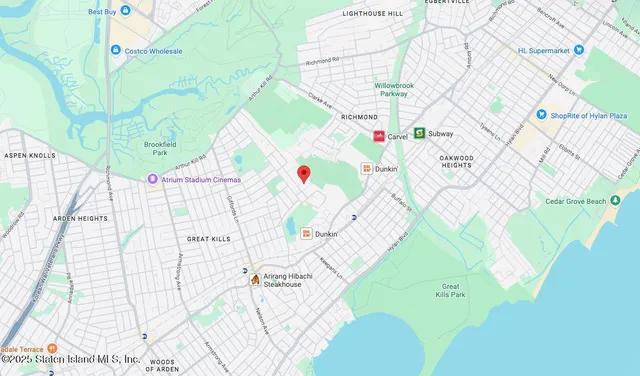 a bathroom with a bathtub and a shower curtain