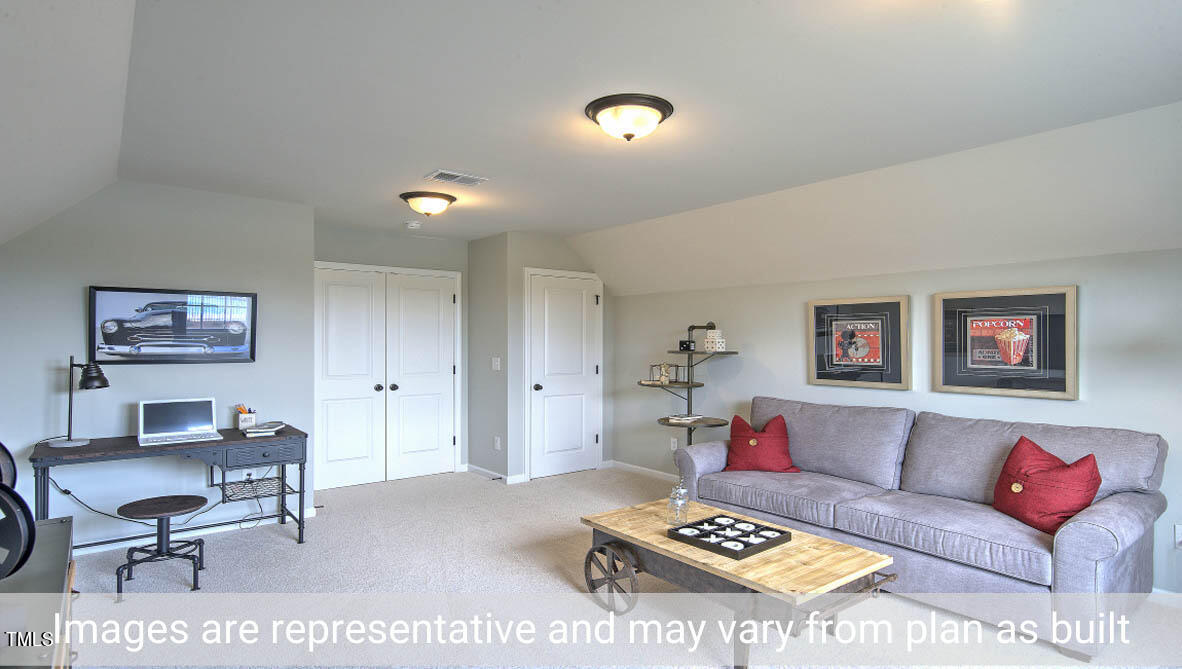 1857 Old Fields Boulevard Haw River, NC 27258 - Photo 42 of 53 a living room with furniture and a work place with wooden floor