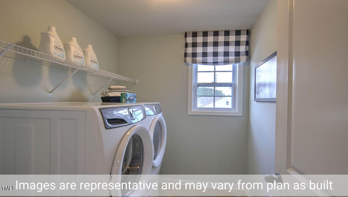 1857 Old Fields Boulevard Haw River, NC 27258 - Photo 46 of 53 a utility room with dryer and washer