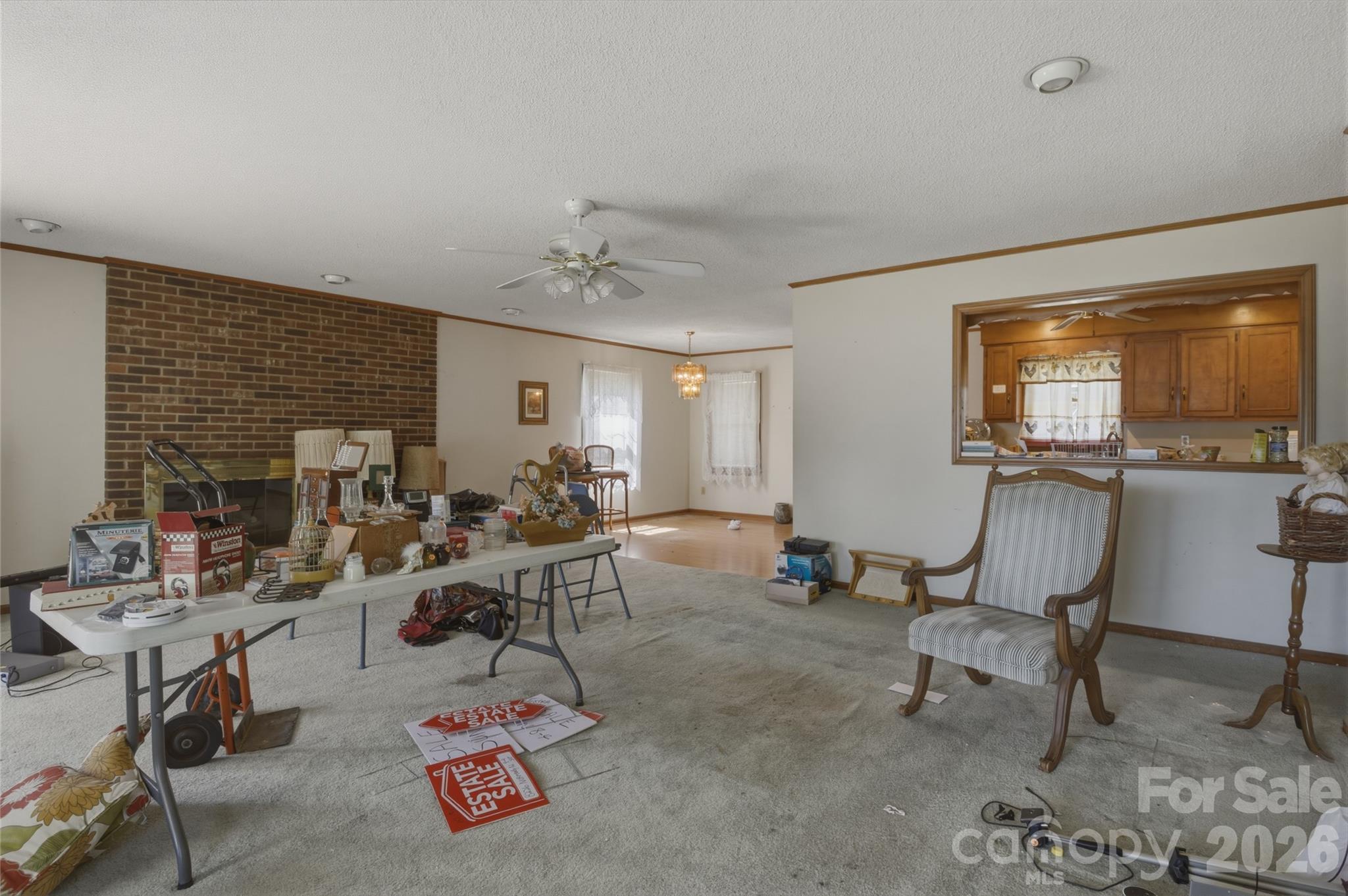 8226 Normandy Road Denver, NC 28037 - Photo 20 of 29 a living room with furniture and a flat screen tv