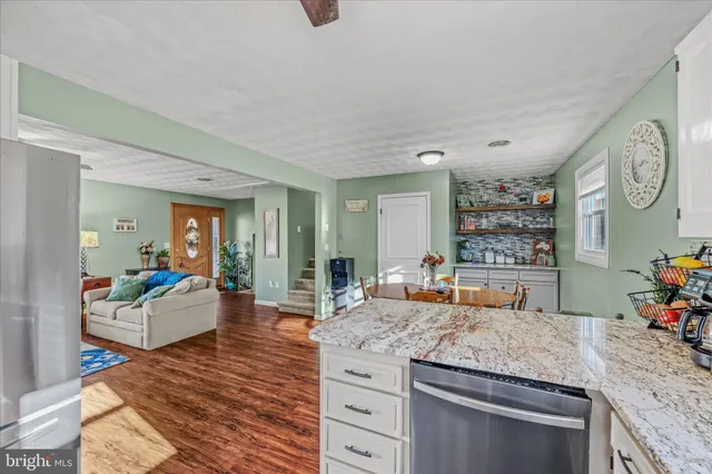 a kitchen with granite countertop lots of counter top space