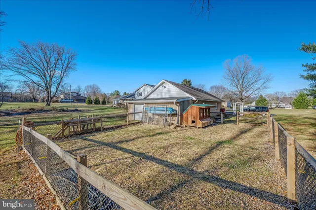 a view of house with outdoor space