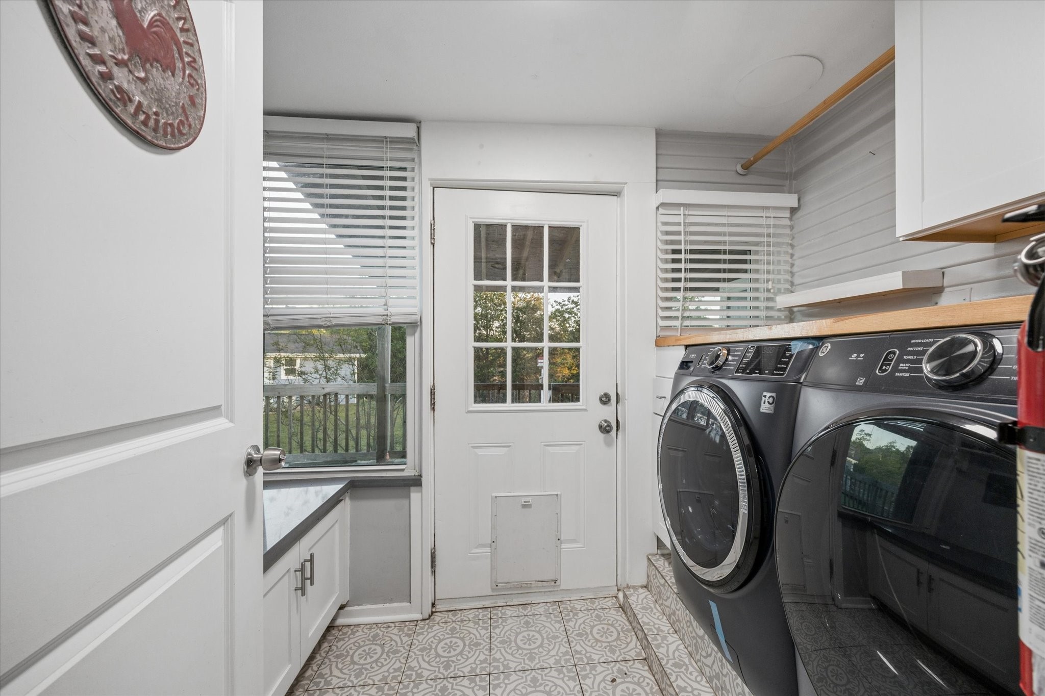 10347 Pless Road Cat Spring, TX 78933 - Photo 20 of 41 Spacious laundry room right off of the kitchen that takes you out to the back patio.