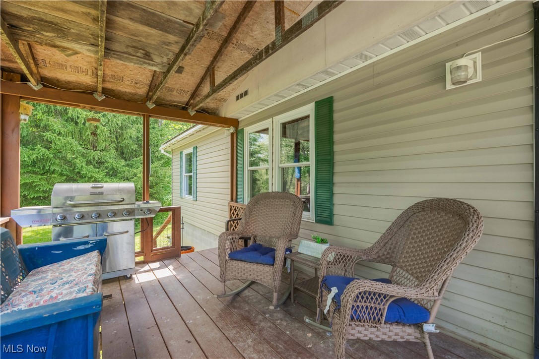 2176 Pageant Road Southeast Carrollton, OH 44615 - Photo 5 of 39 Deck with a grill