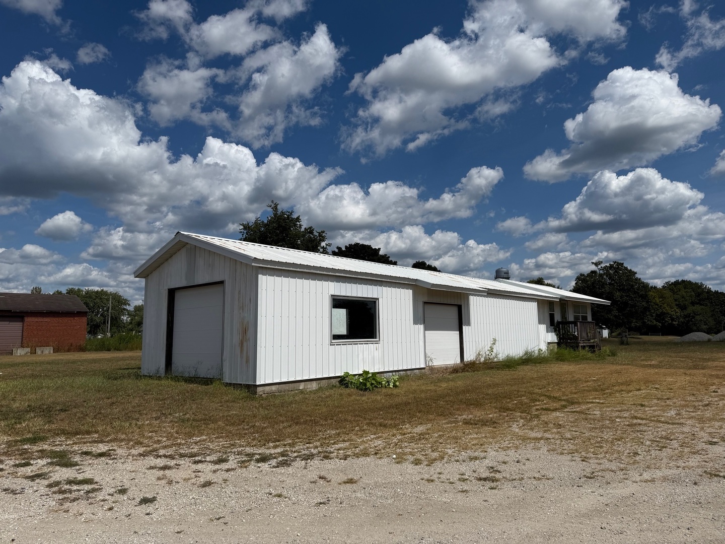 18 Broadway Street Herrick, IL 62431 - Photo 1 of 16 a view of a backyard