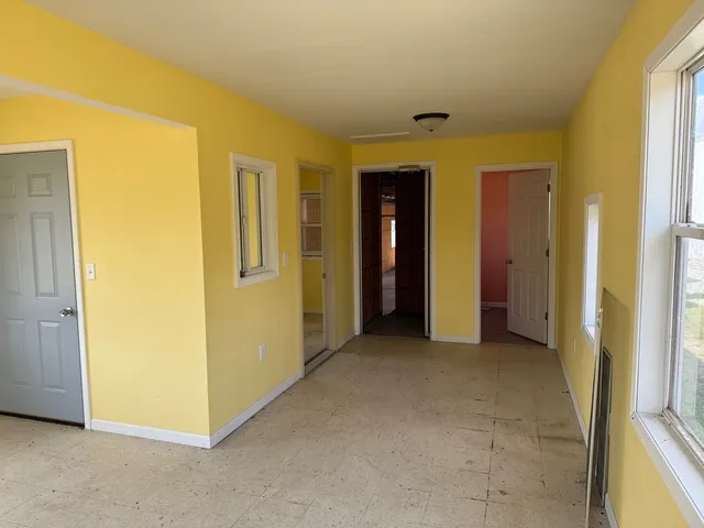a view of a hallway with closet