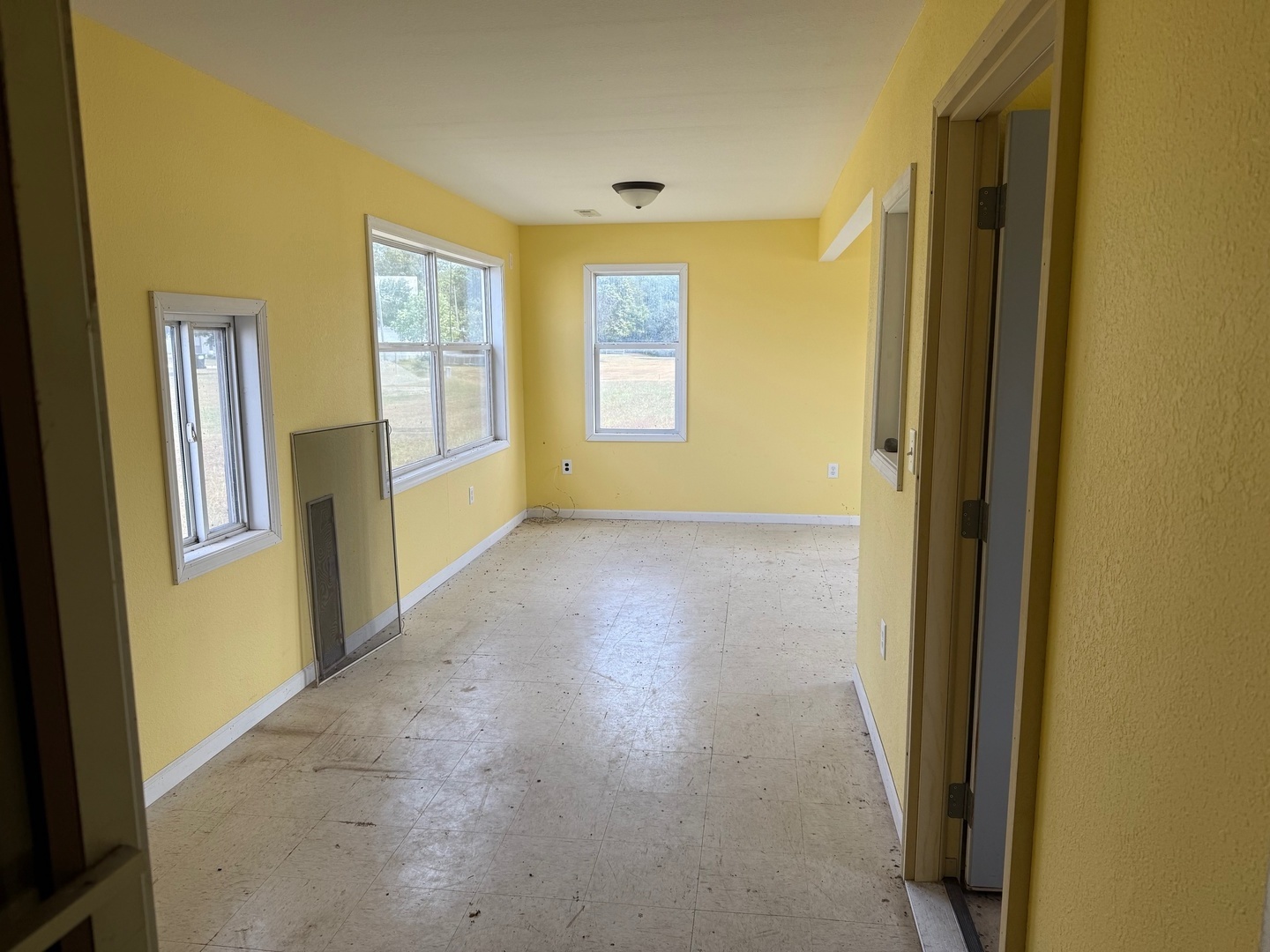 18 Broadway Street Herrick, IL 62431 - Photo 8 of 16 a view of hallway with windows