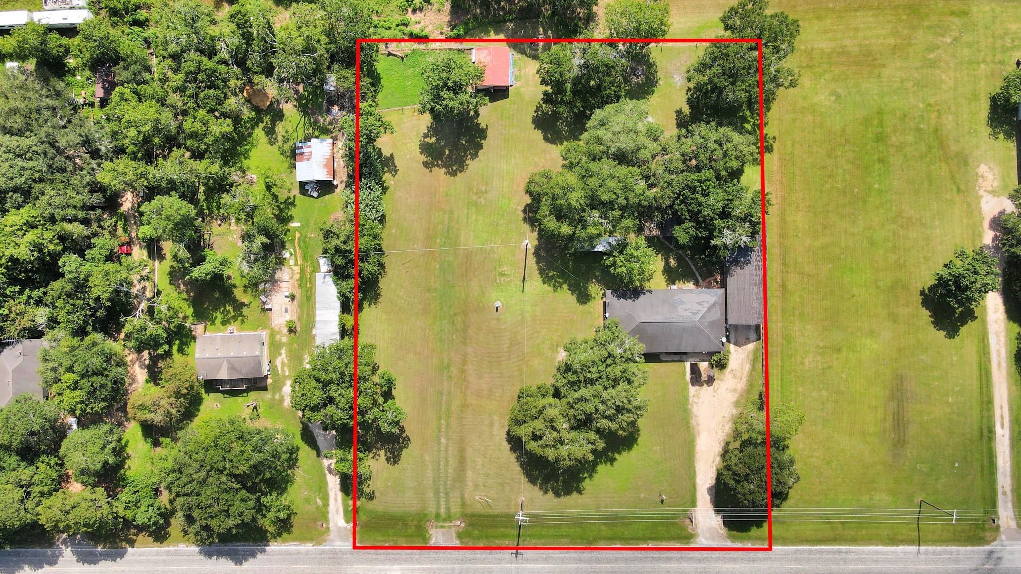 2990 FM 1163 Road El Campo, TX 77437 - Photo 15 of 50 view of a yard