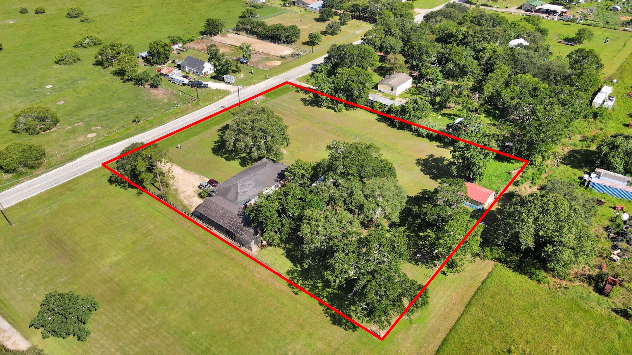 2990 FM 1163 Road El Campo, TX 77437 - Photo 16 of 50 a view of a yard with plants